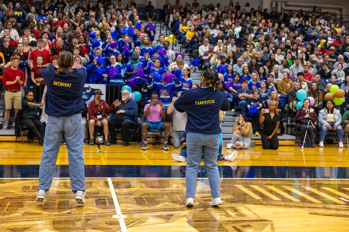 The Bison Song representatives get the crowd fired up at the 2023 pep rally. 