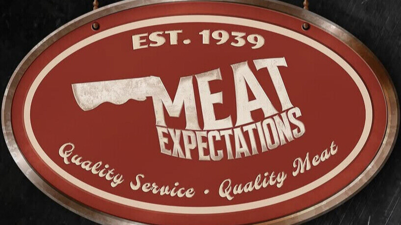 A cropped logo from the Meat Expectations flyer. A stylized red butchershop sign has the following text: "Est. 1939 / Meat Expectations / Quality Service, Quality Meat".